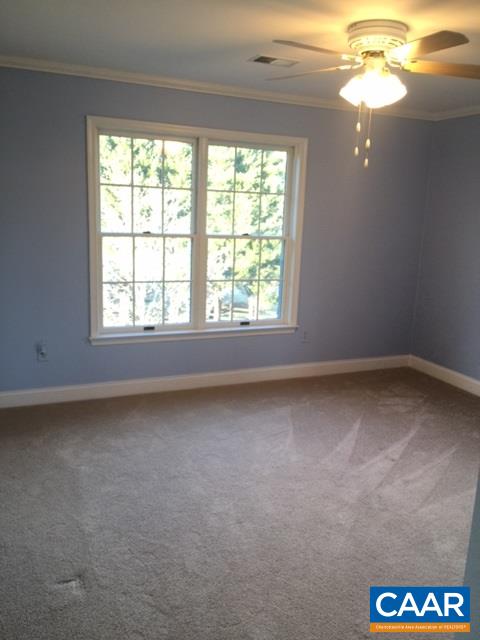 894 Graves Mill Road Madison, VA 22727 - Photo 21 of 40 an empty room with a window