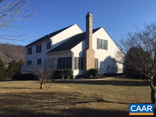 894 Graves Mill Road Madison, VA 22727 - Photo 3 of 40 a front view of a house with garden