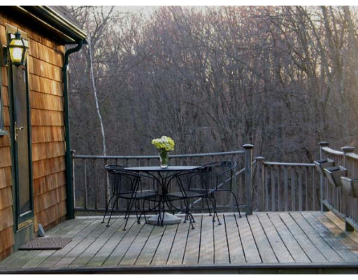 2191 Bay Road Sharon, MA 02067 - Photo 7 of 7 a view of balcony with wooden floor and seating space