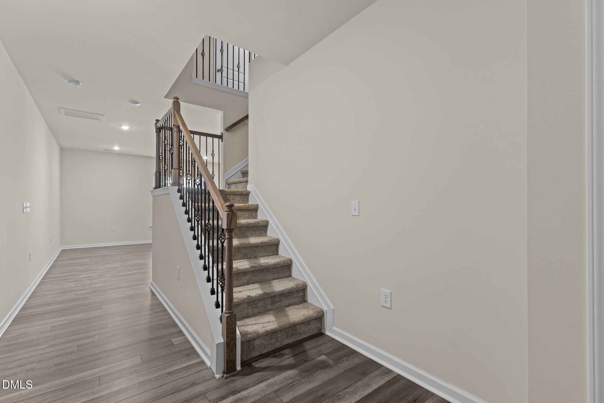 1106 Congleton Place Durham, NC 27703 - Photo 2 of 34 a view of entryway and hall with wooden floor