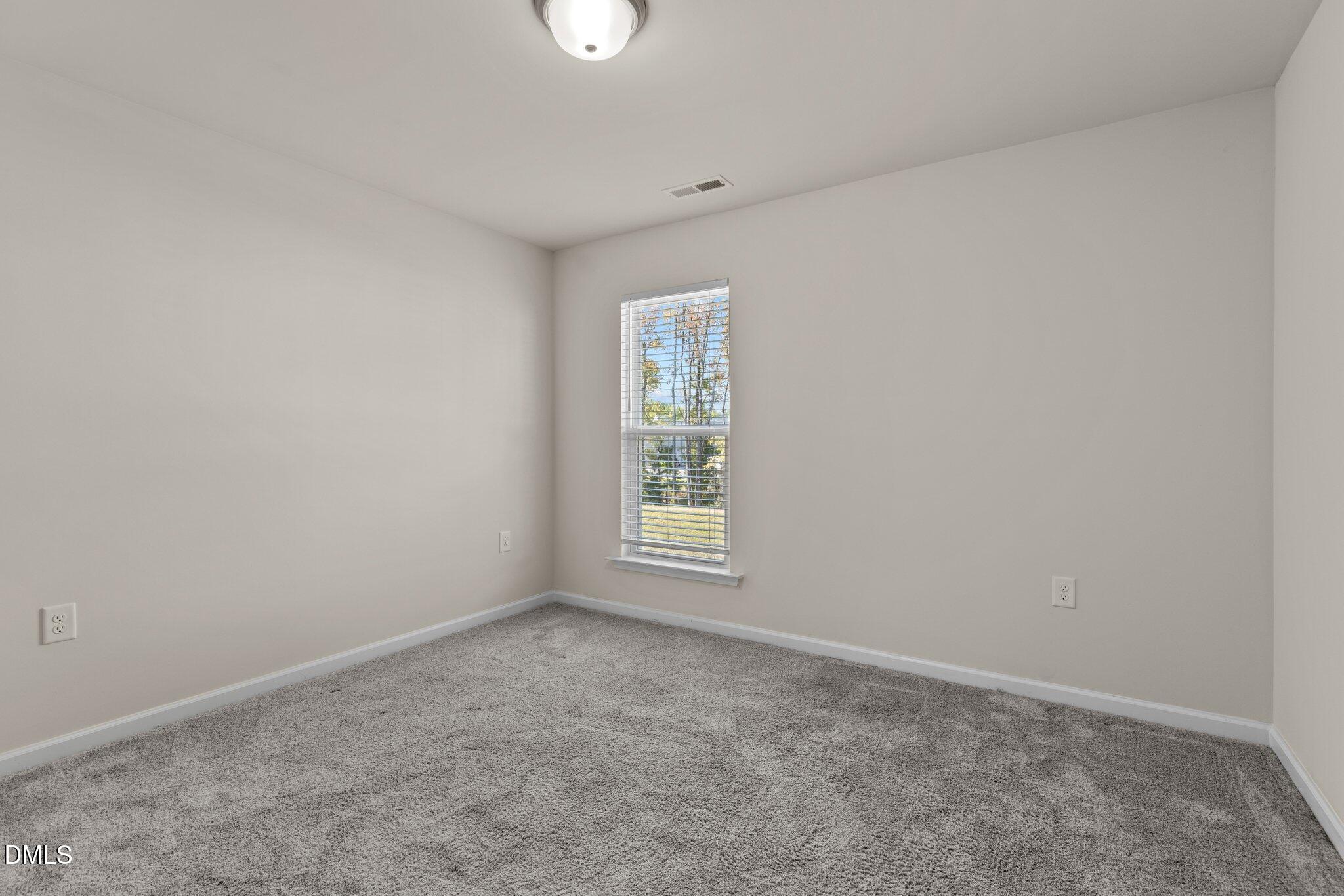 1106 Congleton Place Durham, NC 27703 - Photo 22 of 34 an empty room with a window