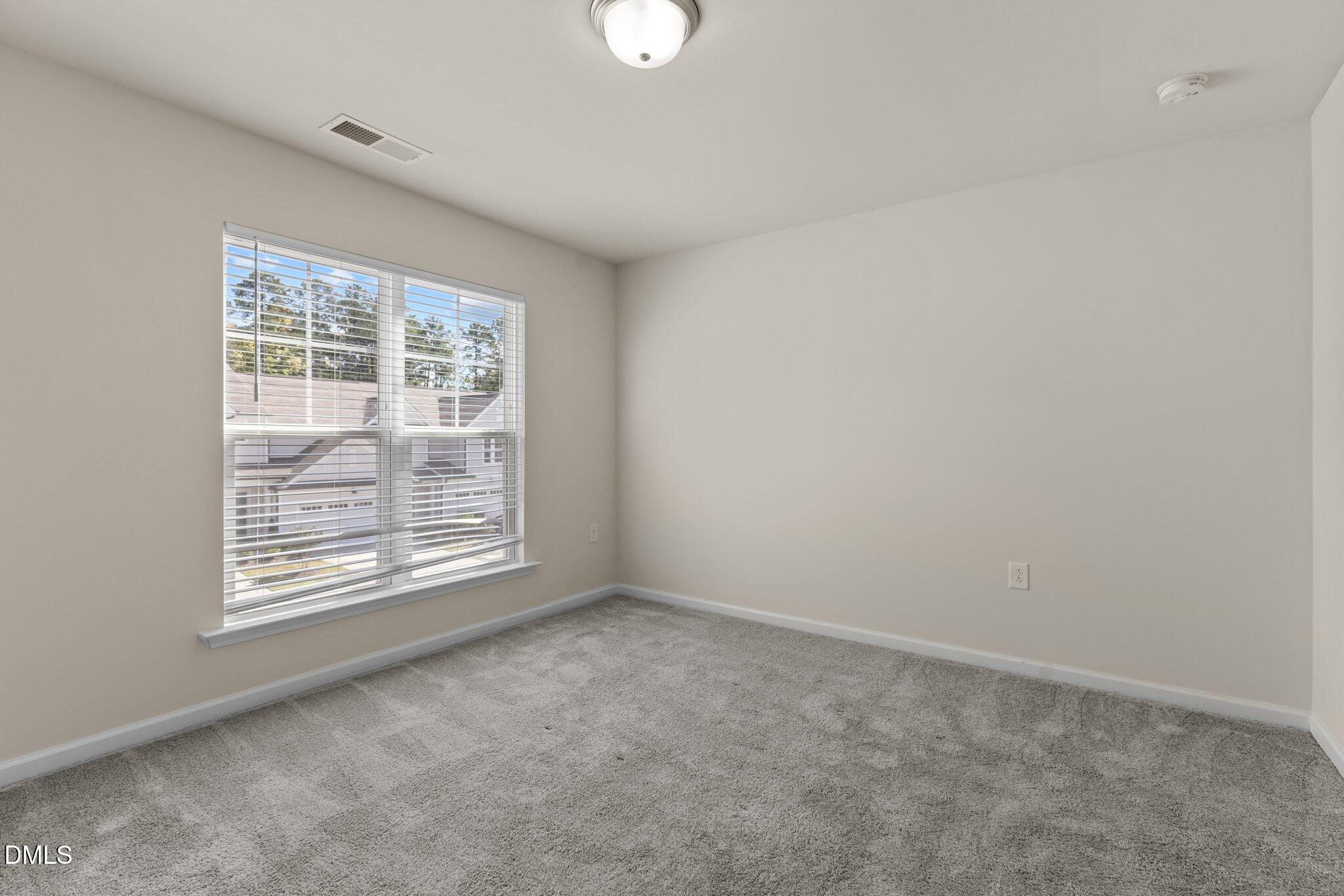 1106 Congleton Place Durham, NC 27703 - Photo 26 of 34 an empty room with windows