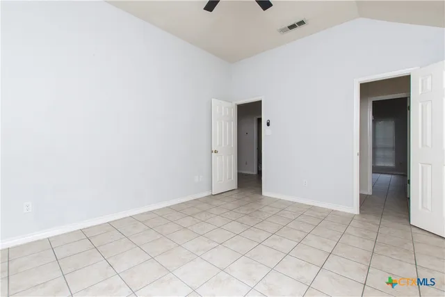 a view of an empty room and window