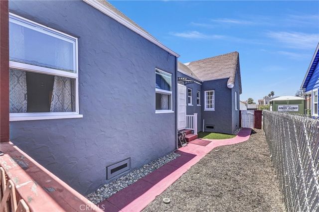 a bed room with a bed and a couch