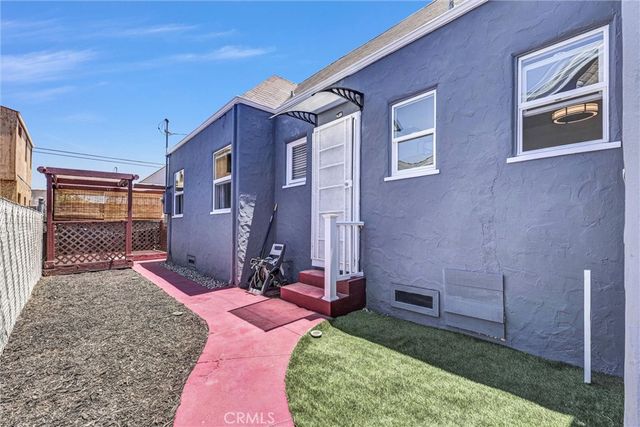 a bedroom with a bed and a view of bathroom