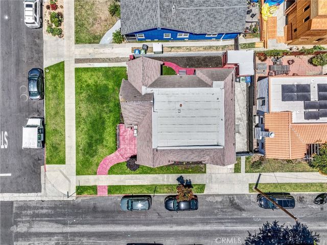 a small garden on the side of a road