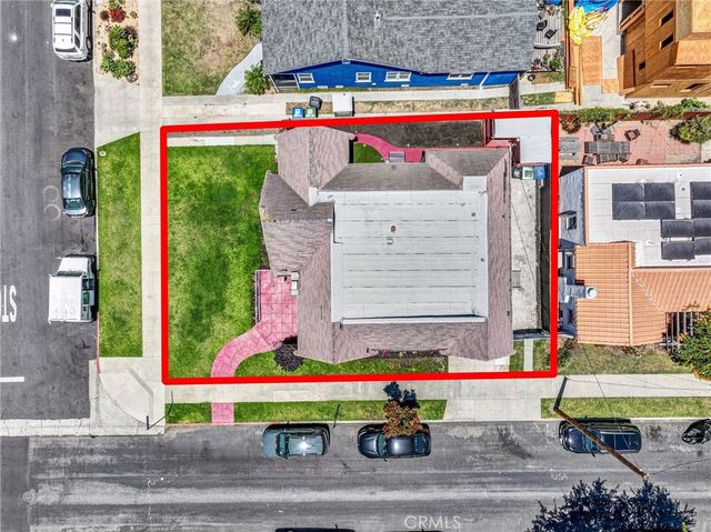 an aerial view of a city with lots of residential buildings