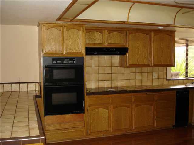 31133 Old River Road Bonsall, CA 92003 - Photo 10 of 18 Another Kitchen shot, Lots of storage. Convection oven. Microwave combination.