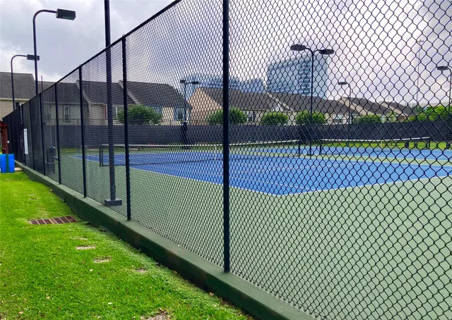 a view of a car parked in front of a building