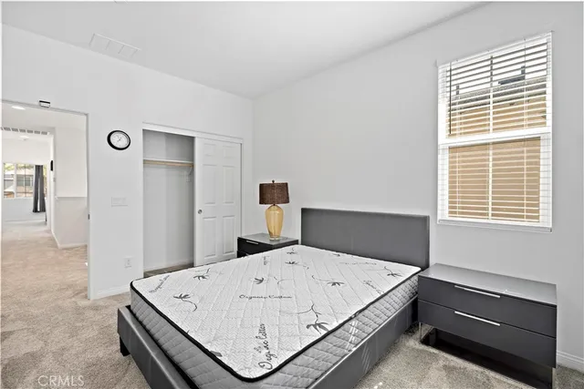 a view of a balcony with furniture and window