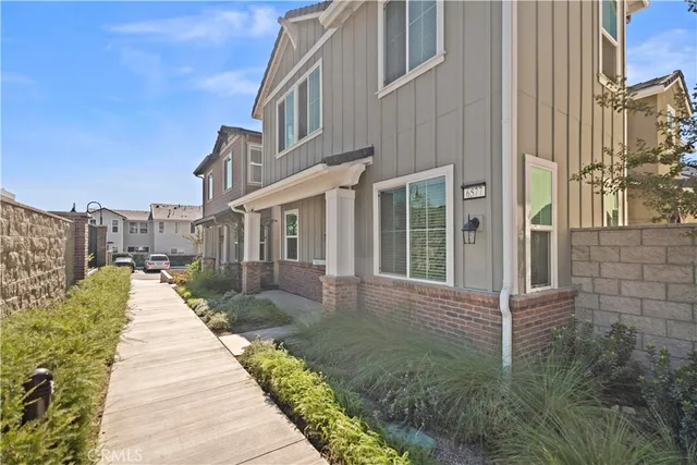 a view of a house with a street