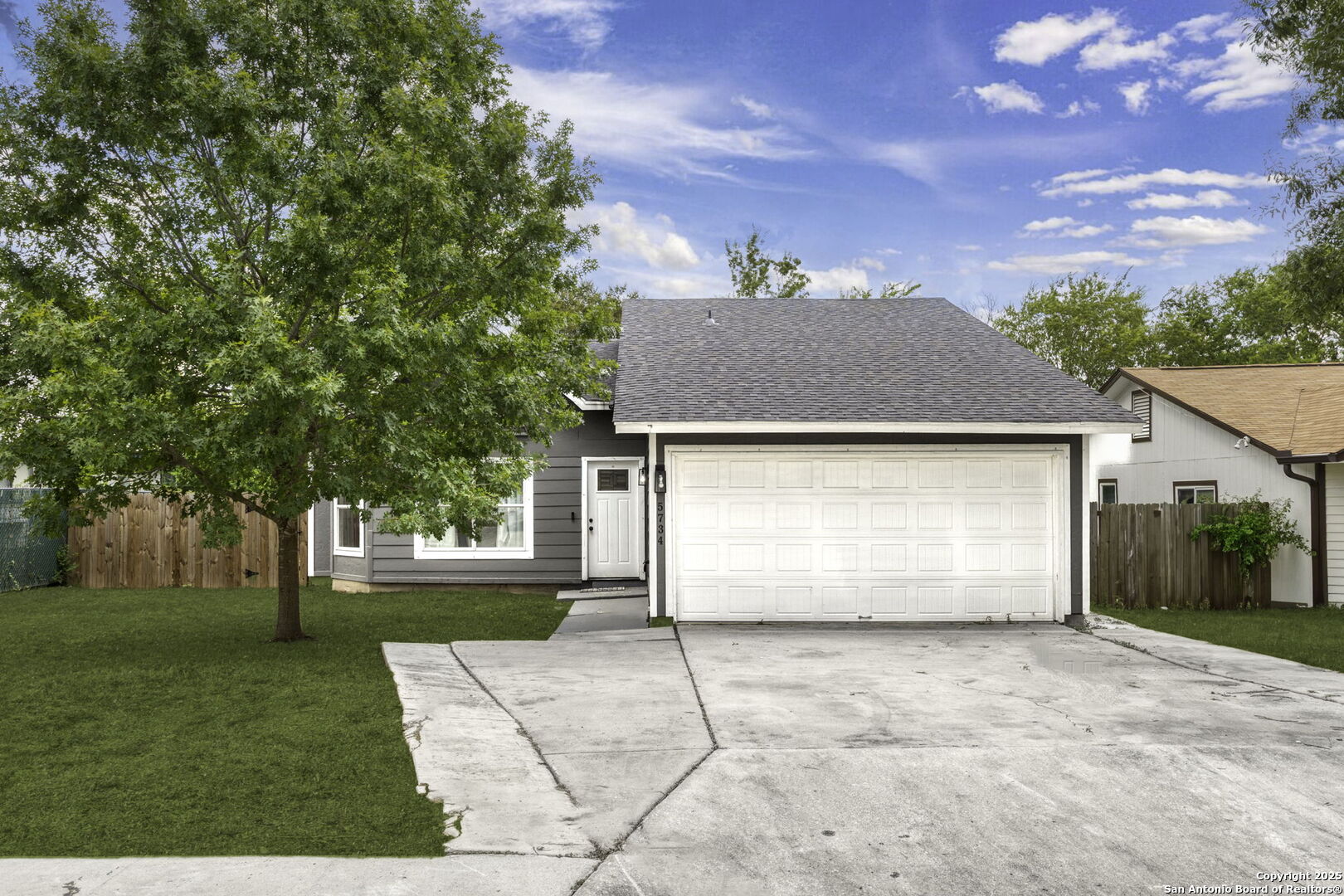 a front view of house with yard