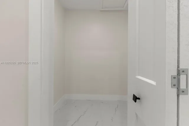 a view of a livingroom with windows