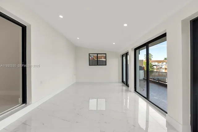 a view of a balcony with furniture