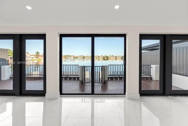 a view of a balcony with furniture