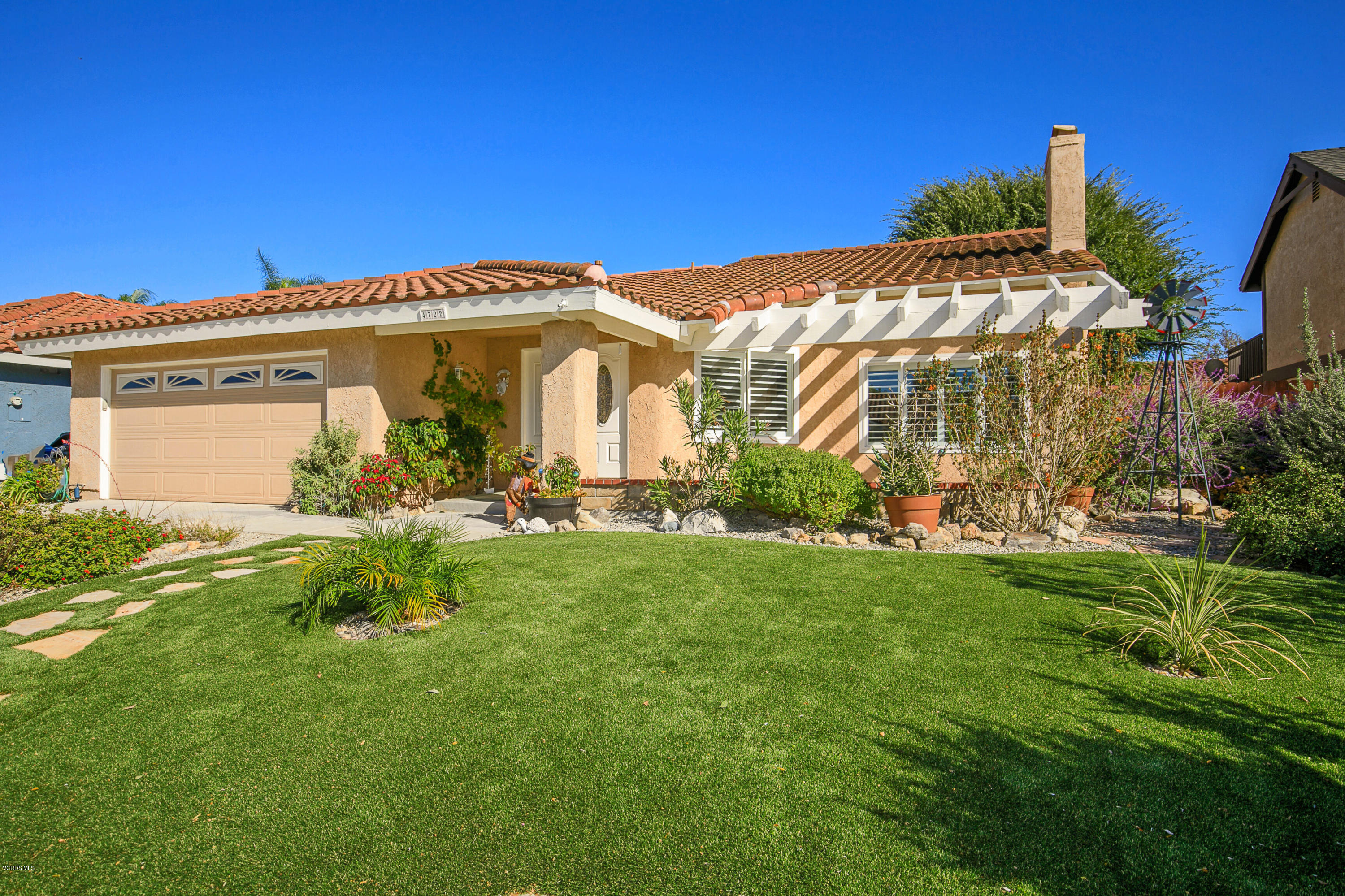 4722 Avedon Road Moorpark, CA 93021 - Photo 1 of 38 a front view of a house with a yard