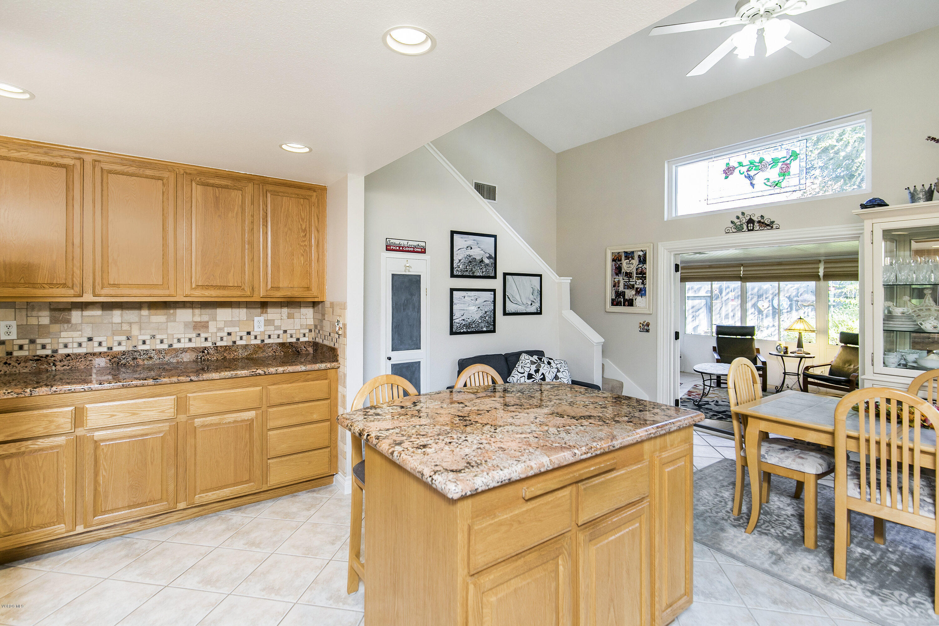 4722 Avedon Road Moorpark, CA 93021 - Photo 14 of 38 a kitchen with granite countertop sink and cabinets