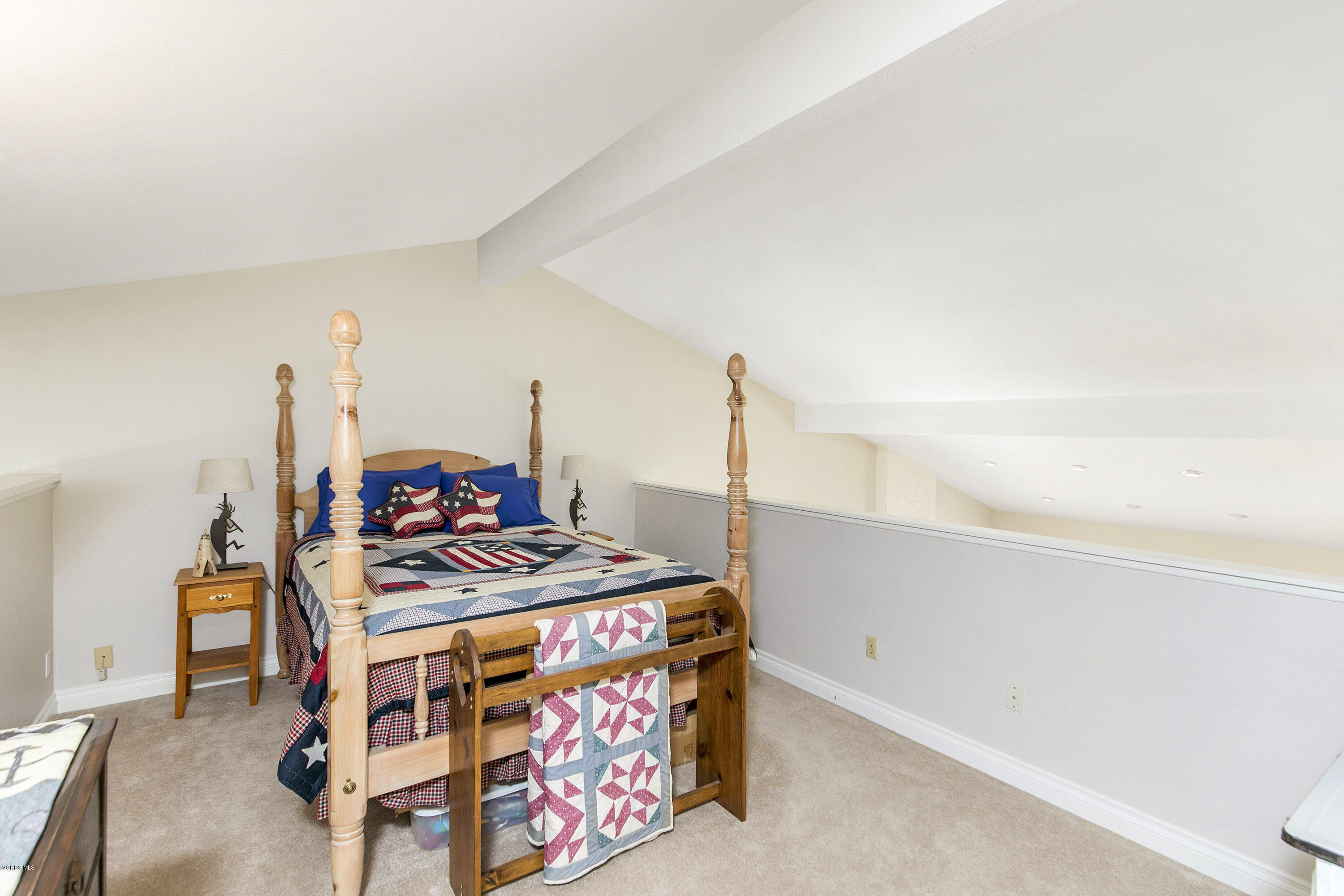 4722 Avedon Road Moorpark, CA 93021 - Photo 19 of 38 a bedroom with a bed and a table in it