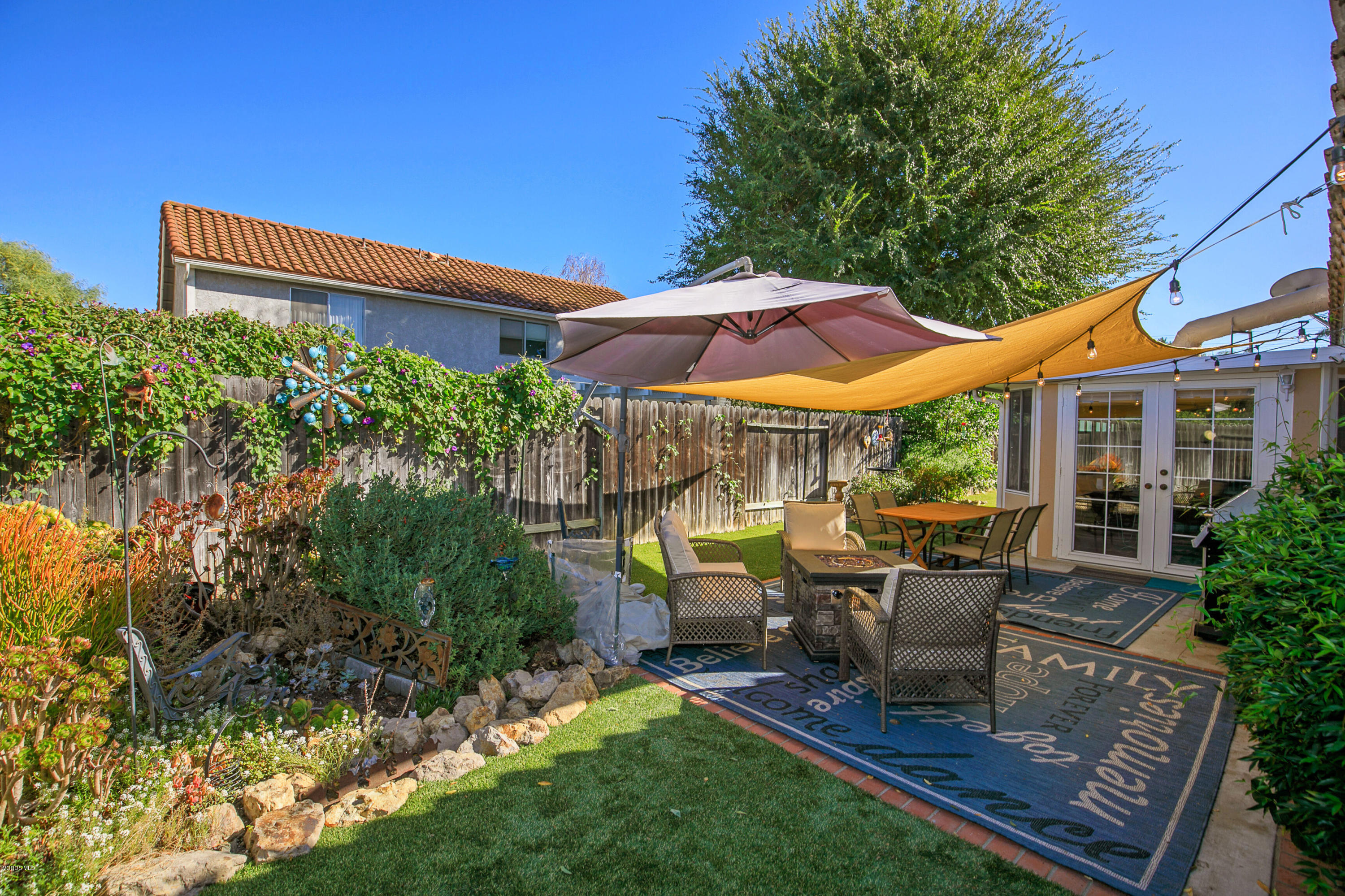 4722 Avedon Road Moorpark, CA 93021 - Photo 32 of 38 a view of house with outdoor seating and yard