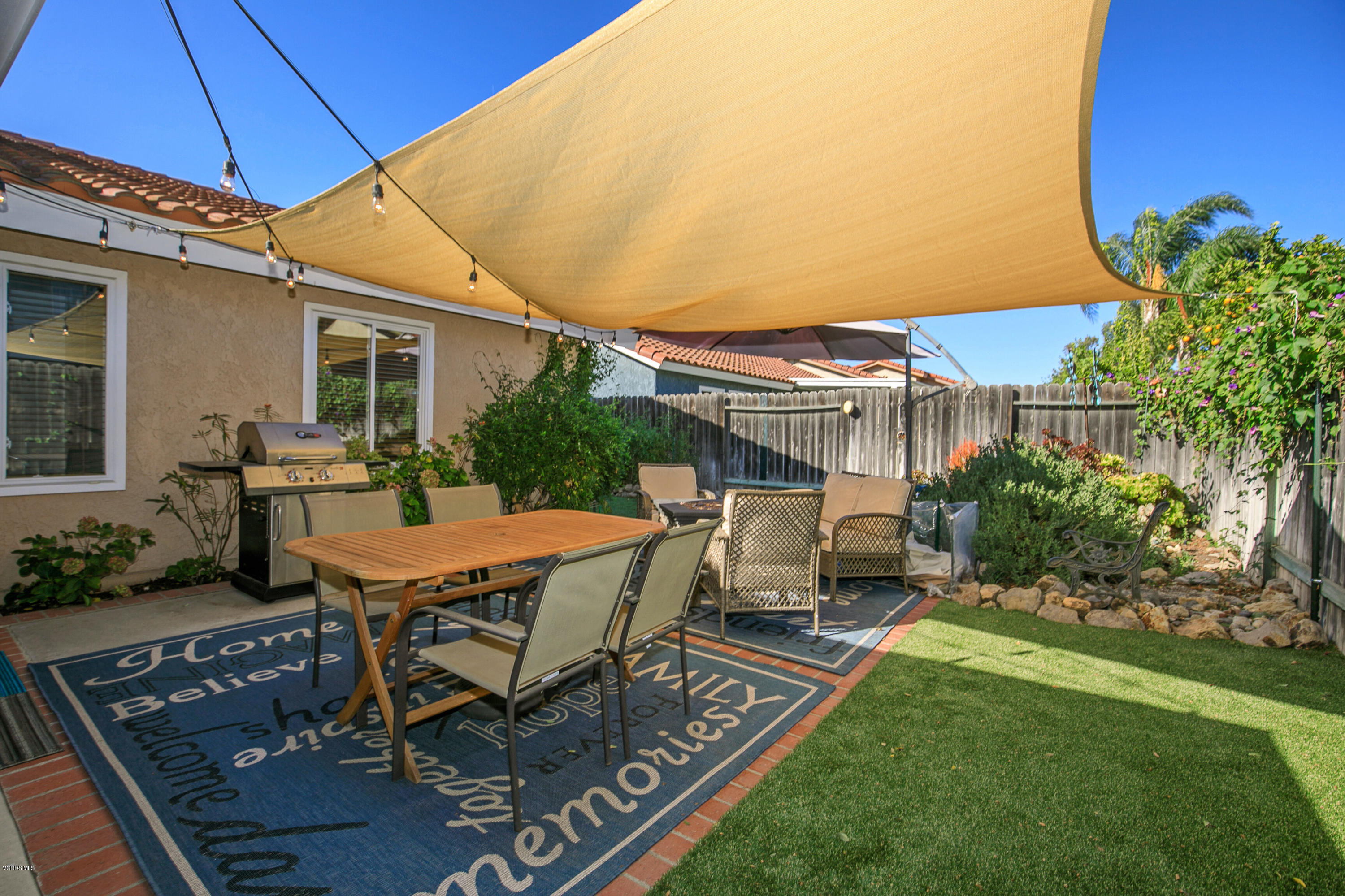 4722 Avedon Road Moorpark, CA 93021 - Photo 34 of 38 a patio with table and chairs
