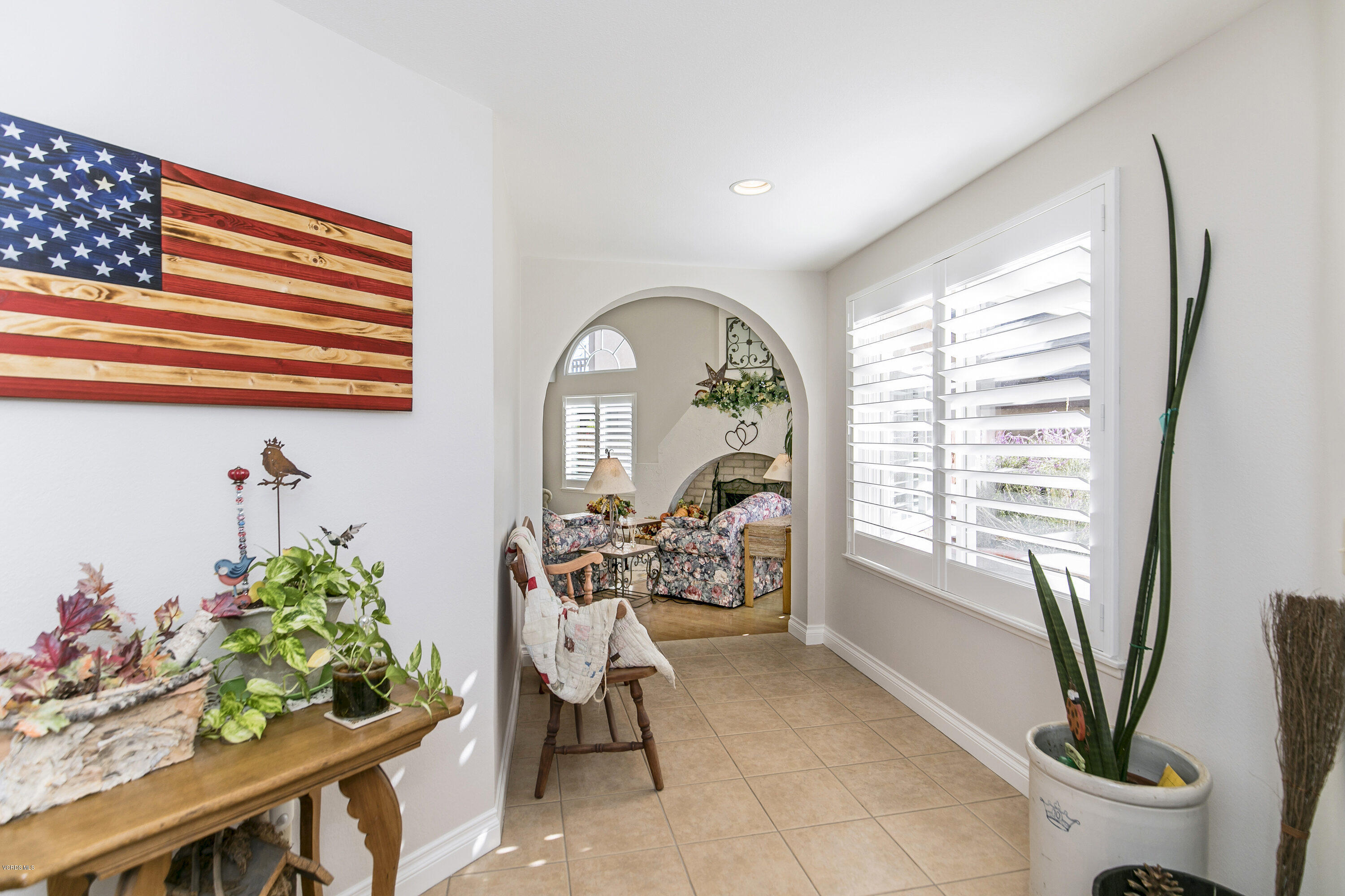 4722 Avedon Road Moorpark, CA 93021 - Photo 6 of 38 a living room with furniture and a potted plant