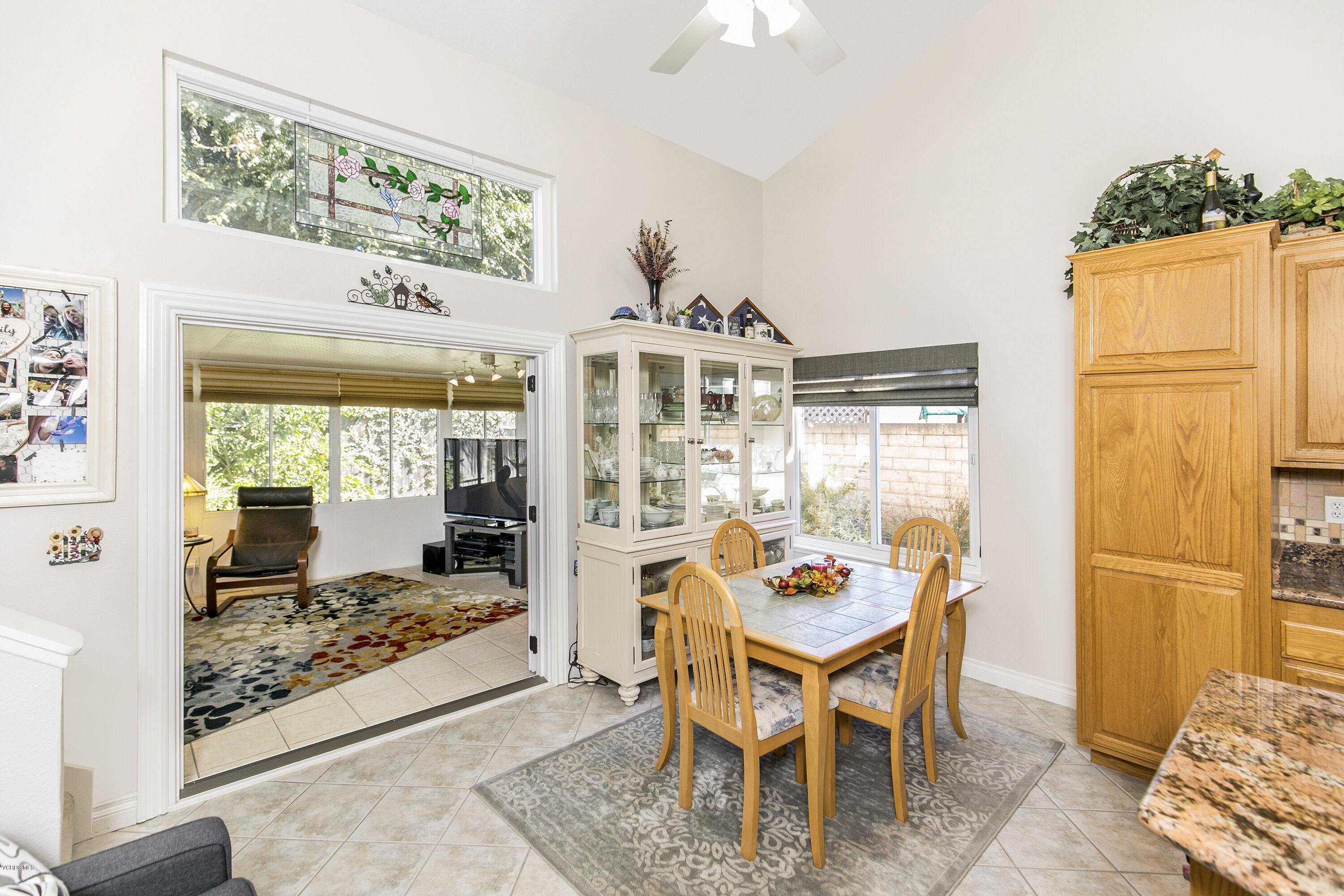 4722 Avedon Road Moorpark, CA 93021 - Photo 10 of 38 a dining room with furniture and a floor to ceiling window