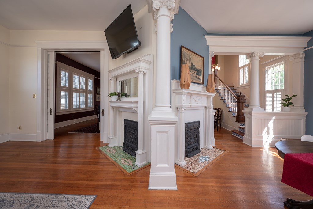 215 7th Street Columbus, GA 31901 - Photo 17 of 64 a living room with fireplace furniture and a flat screen tv