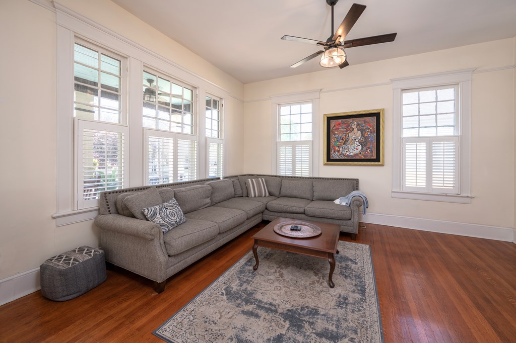 215 7th Street Columbus, GA 31901 - Photo 18 of 64 a living room with furniture and a window