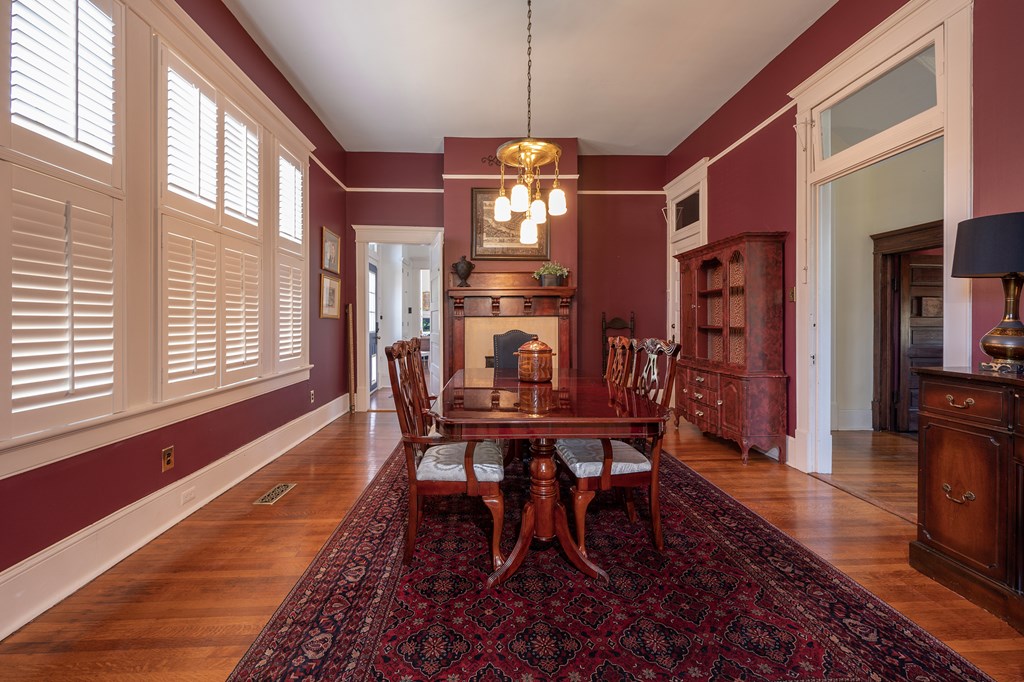 215 7th Street Columbus, GA 31901 - Photo 21 of 64 a view of a dining room with furniture window and wooden floor