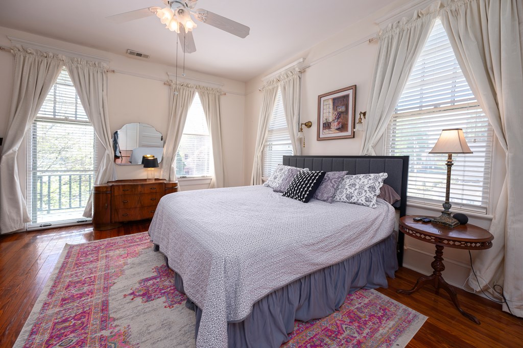 215 7th Street Columbus, GA 31901 - Photo 51 of 64 a bedroom with a bed and a large window
