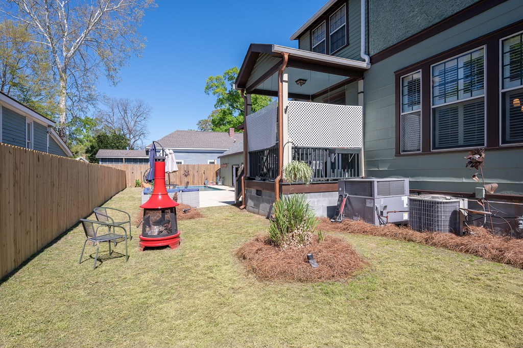 215 7th Street Columbus, GA 31901 - Photo 53 of 64 a backyard of a house with table and chairs
