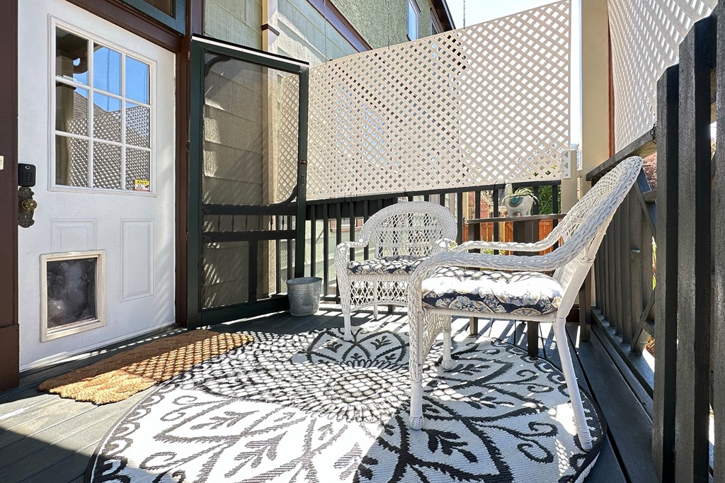 215 7th Street Columbus, GA 31901 - Photo 54 of 64 a balcony view with a table and chairs