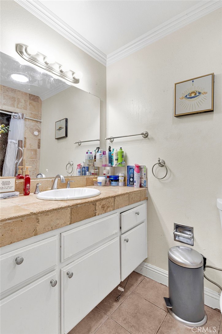 1087 Baseline Road La Verne, CA 91750 - Photo 18 of 39 a bathroom with a sink and a mirror