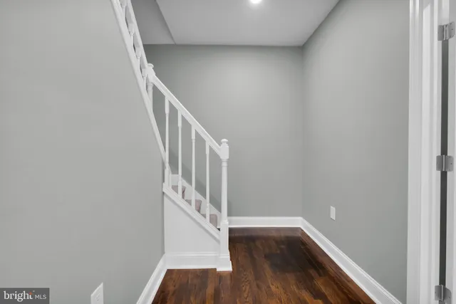 a view of entryway with wooden floor