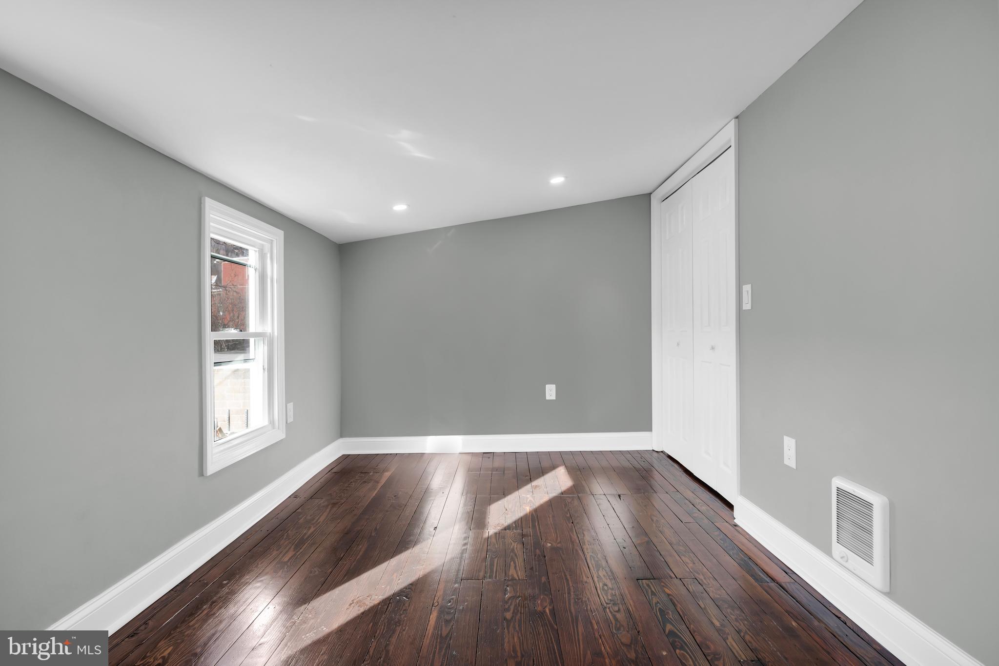 504 Pine Street Tamaqua, PA 18252 - Photo 21 of 27 a view of empty room with wooden floor