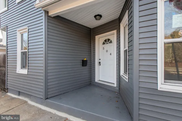 a view of a porch with a door
