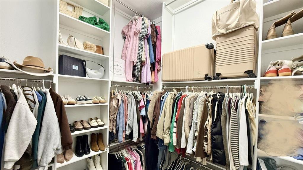207 Buffalo Boulevard Rhome, TX 76078 - Photo 19 of 40 Three-tiered PRIMARY closet perfect to access seasonal storage.