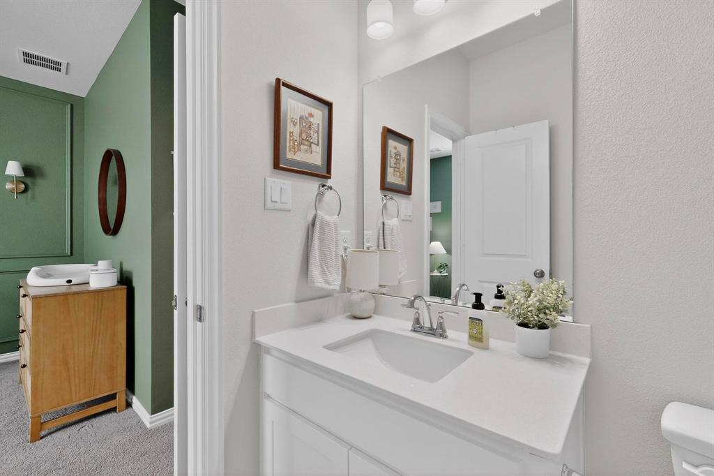207 Buffalo Boulevard Rhome, TX 76078 - Photo 22 of 40 Full bath ensuite, perfect for inlaws, guests or the oldest child.