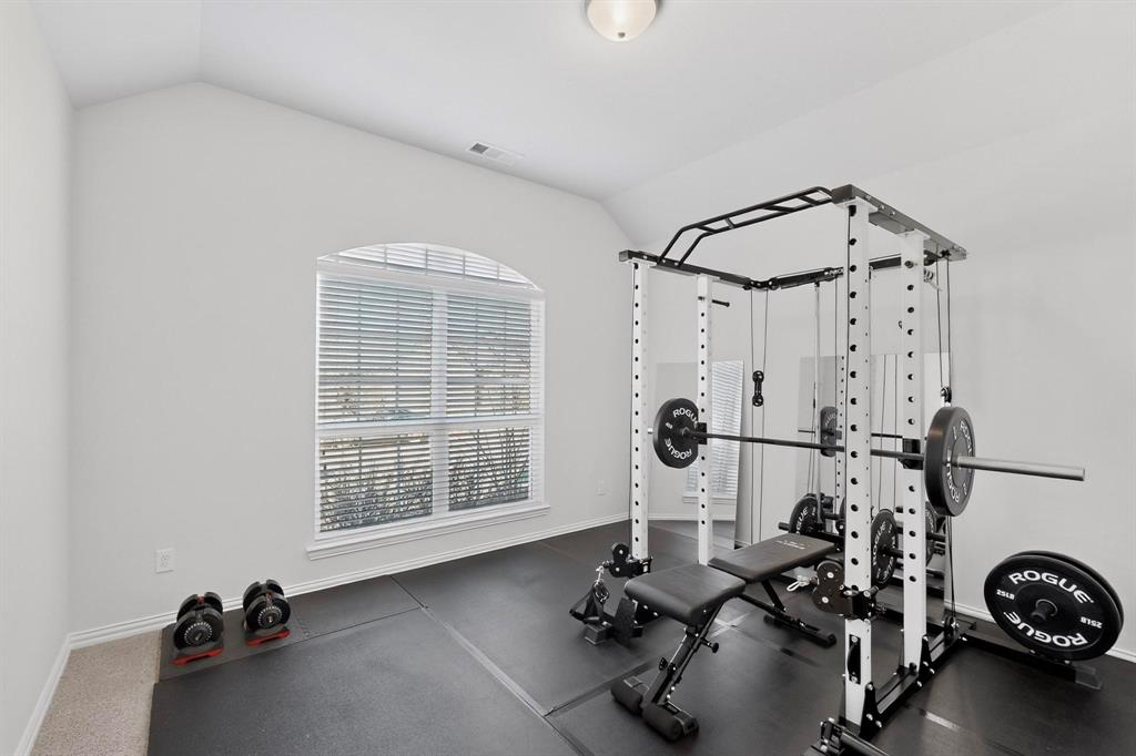 207 Buffalo Boulevard Rhome, TX 76078 - Photo 26 of 40 The front bedroom serving as exercise room allows daylight to dawn.