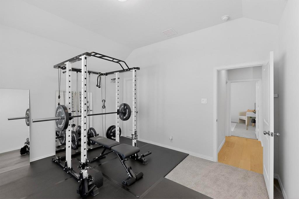 207 Buffalo Boulevard Rhome, TX 76078 - Photo 27 of 40 Truly a favorite bedroom with WIC or as an office, separate from gathering spaces.