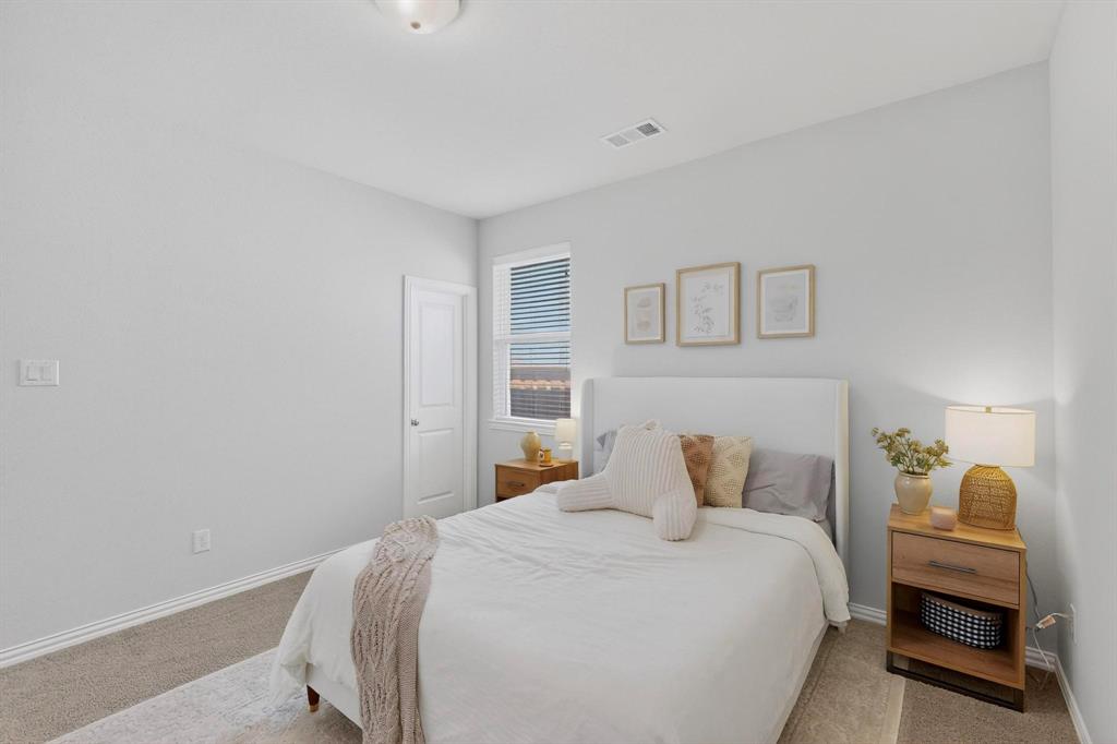 207 Buffalo Boulevard Rhome, TX 76078 - Photo 29 of 40 This side Bedroom is perfect for guests w.full walk-in closet.