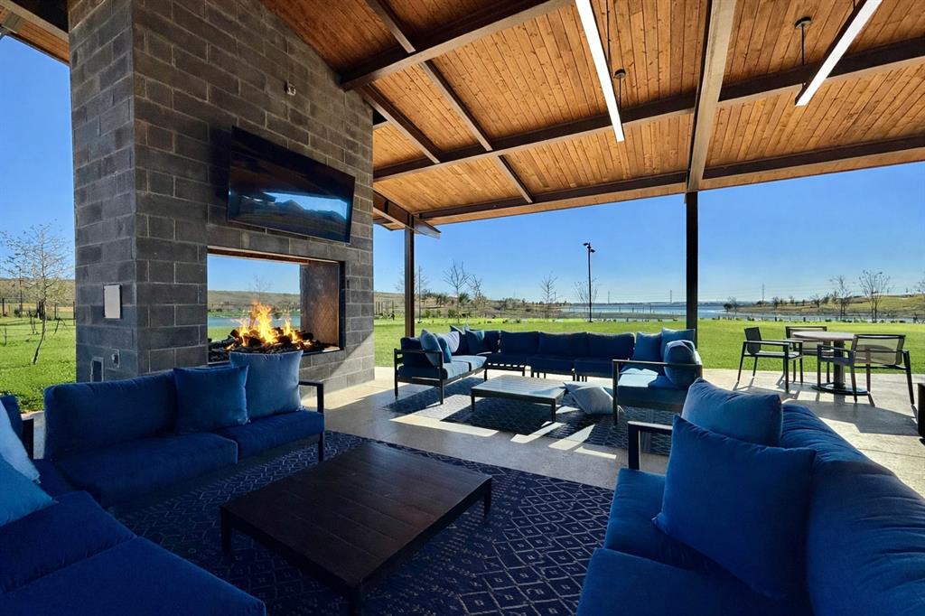 207 Buffalo Boulevard Rhome, TX 76078 - Photo 39 of 40 Gather here in style. One of many lounges and connection spots.