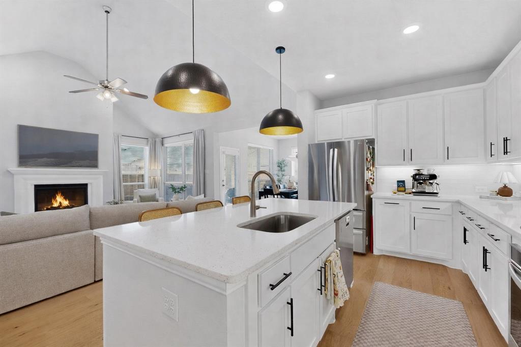 207 Buffalo Boulevard Rhome, TX 76078 - Photo 8 of 40 Delightful function and golden domed lighting.