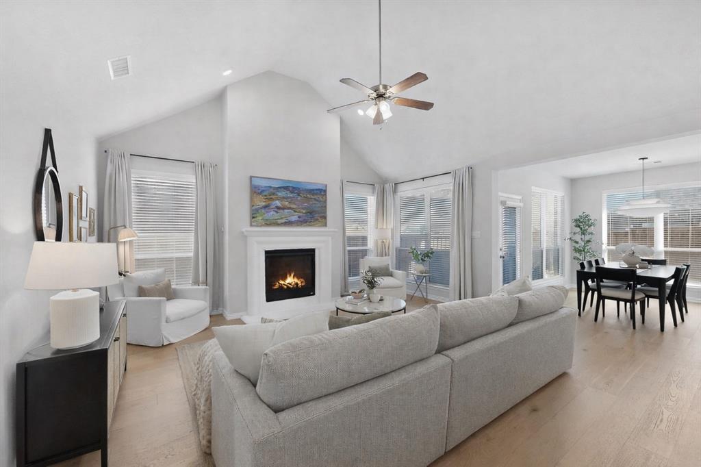 207 Buffalo Boulevard Rhome, TX 76078 - Photo 10 of 40 Notice the windows that wrap the entire living and dining spaces.