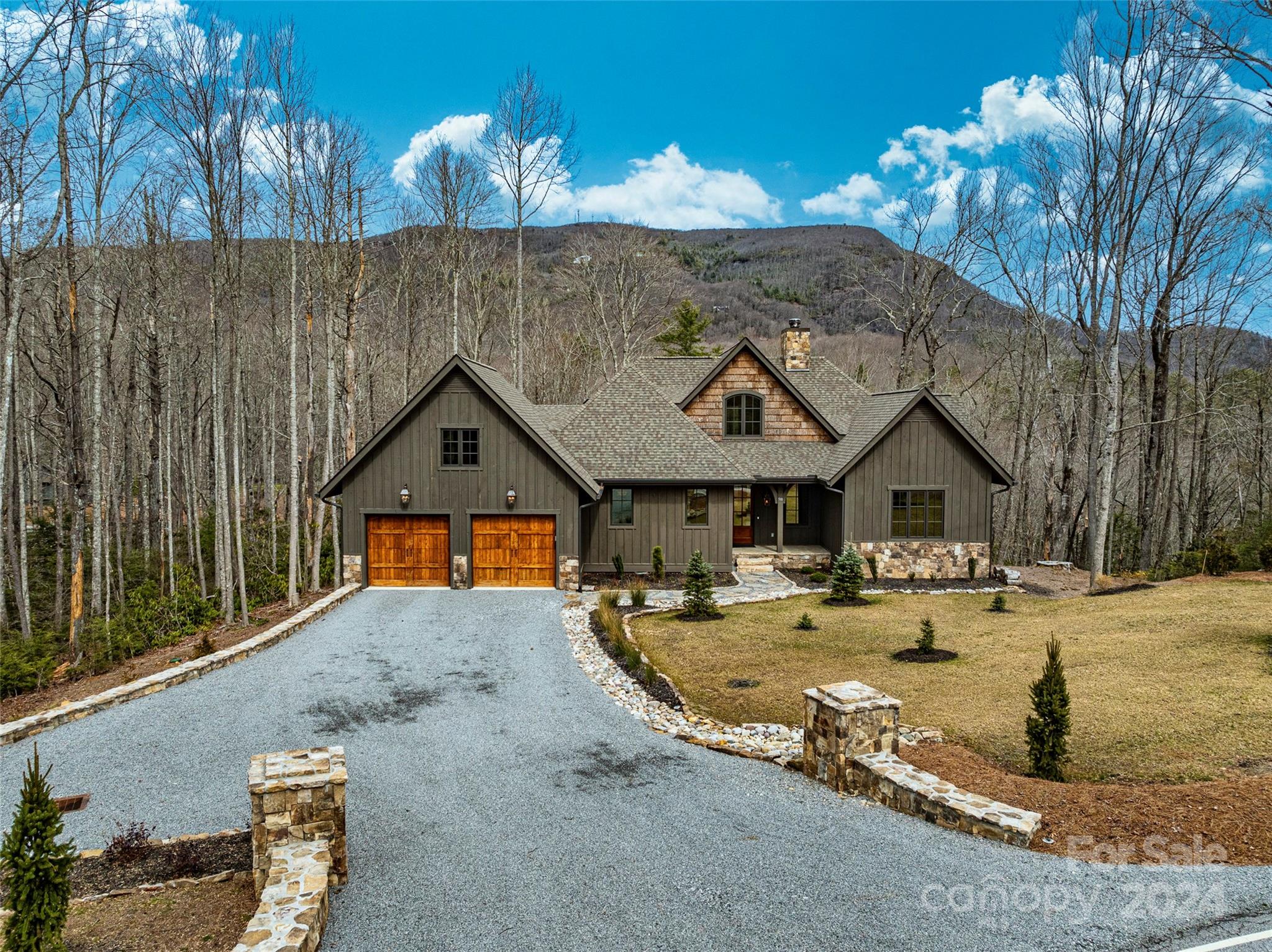 510 Boiling Springs Road Sapphire, NC 28774 - Photo 1 of 48 a view of a house with a swimming pool