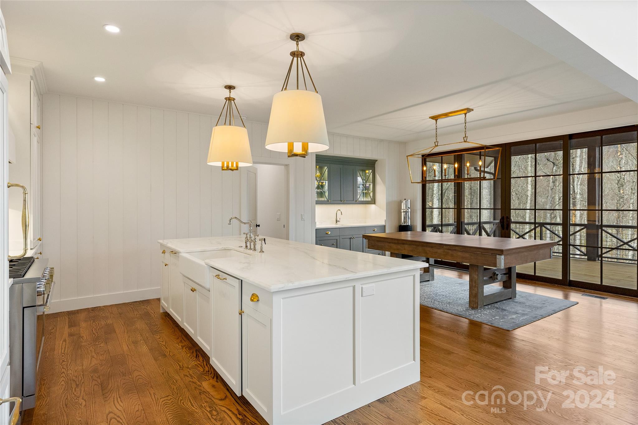 510 Boiling Springs Road Sapphire, NC 28774 - Photo 12 of 48 a bathroom with a sink a vanity and a large mirror
