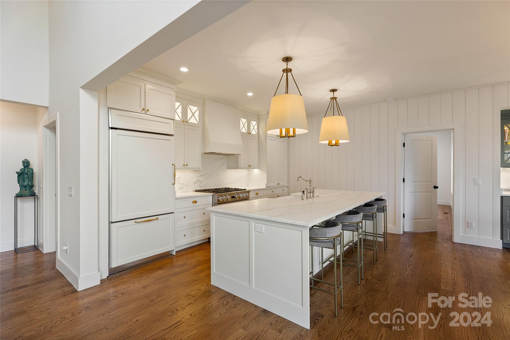 510 Boiling Springs Road Sapphire, NC 28774 - Photo 13 of 48 a kitchen with a refrigerator a sink and a stove top oven