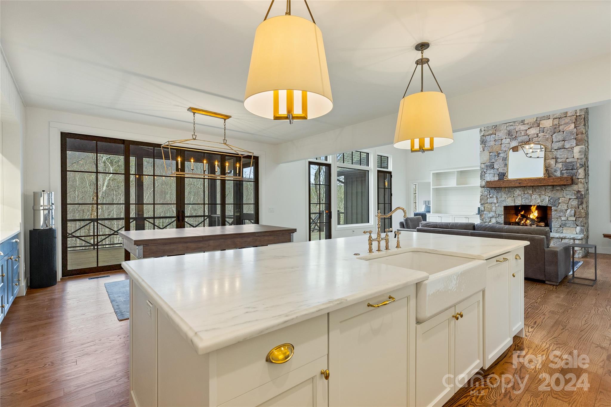 510 Boiling Springs Road Sapphire, NC 28774 - Photo 16 of 48 a large white kitchen with a large window