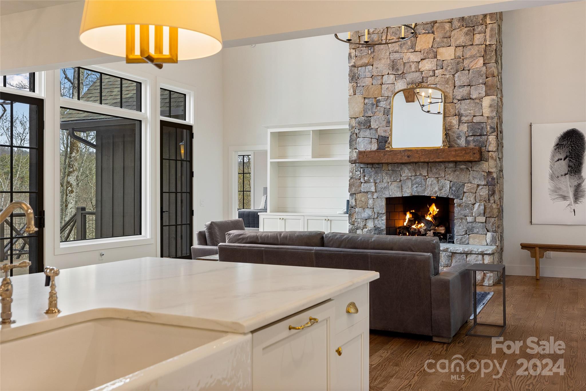 510 Boiling Springs Road Sapphire, NC 28774 - Photo 17 of 48 a living room with furniture and a fireplace