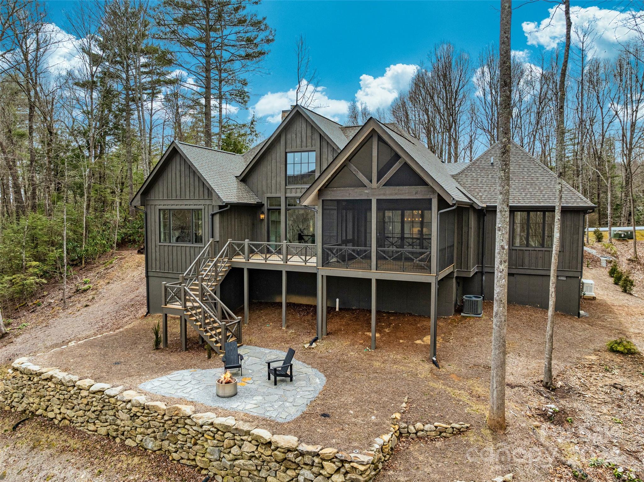 510 Boiling Springs Road Sapphire, NC 28774 - Photo 3 of 48 a front view of a house with a garden